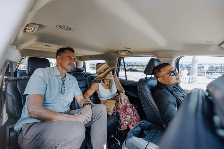 couple in private transfer of de palm tours